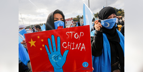 Uyghur demonstrators in a protest against China in Istanbul, October 2021 (CNS photo/Dilara Senkaya, Reuters)